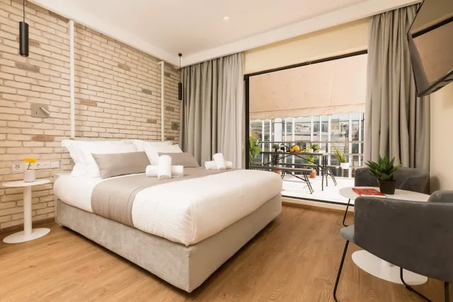 Billede av hotellet Suites Syngrou-Fix - nummer 1 af 6