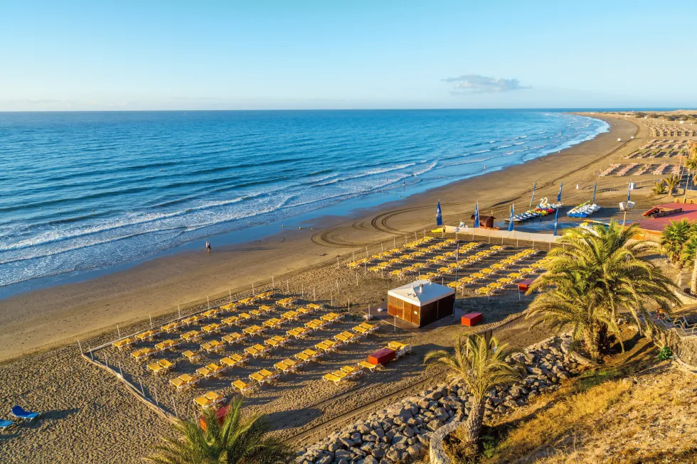 Solopgang over stranden i Playa del Ingles 